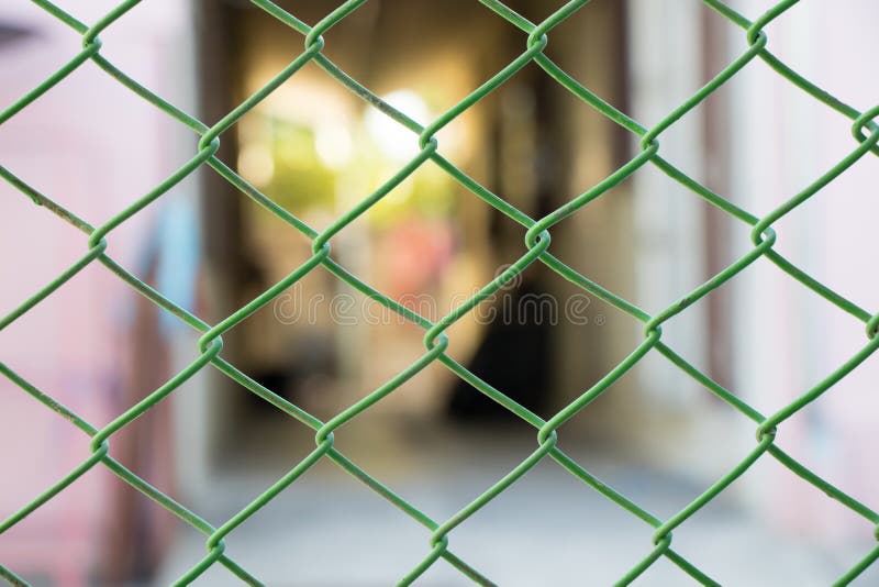 The door Steel wire fence stock photo. Image of pattern 84662962