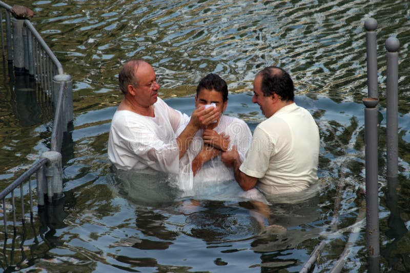 Baptismal site at Jordan river shore Baptism of pilgrims in Yardenit, Israel on September 30, 2006. Baptismal site at Jordan river shore Baptism of pilgrims in Yardenit, Israel on September 30, 2006