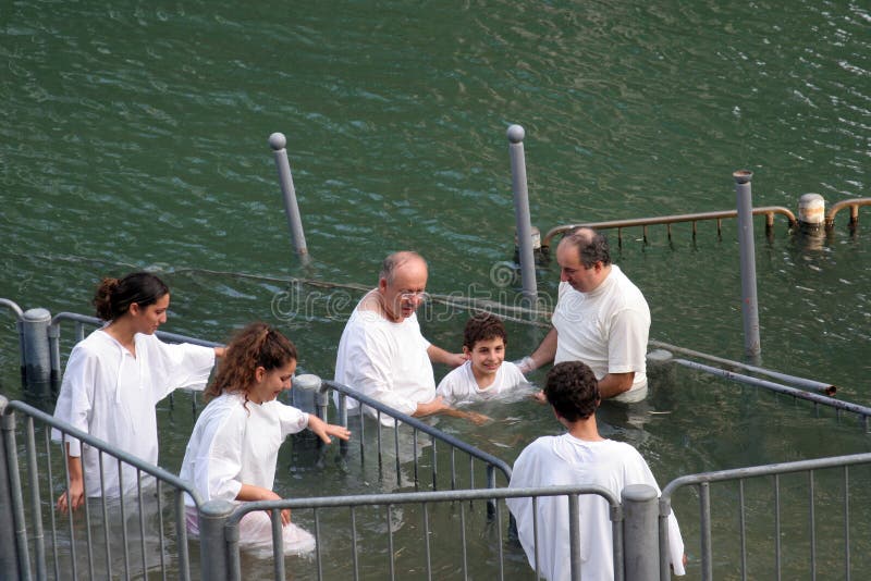 Baptismal site at Jordan river shore Baptism of pilgrims in Yardenit, Israel on September 30, 2006. Baptismal site at Jordan river shore Baptism of pilgrims in Yardenit, Israel on September 30, 2006
