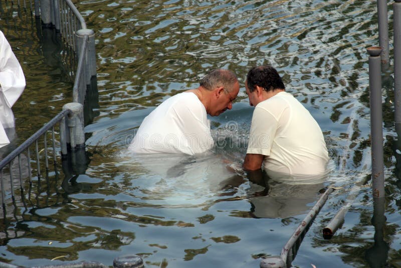 Baptismal site at Jordan river shore Baptism of pilgrims in Yardenit, Israel on September 30, 2006. Baptismal site at Jordan river shore Baptism of pilgrims in Yardenit, Israel on September 30, 2006