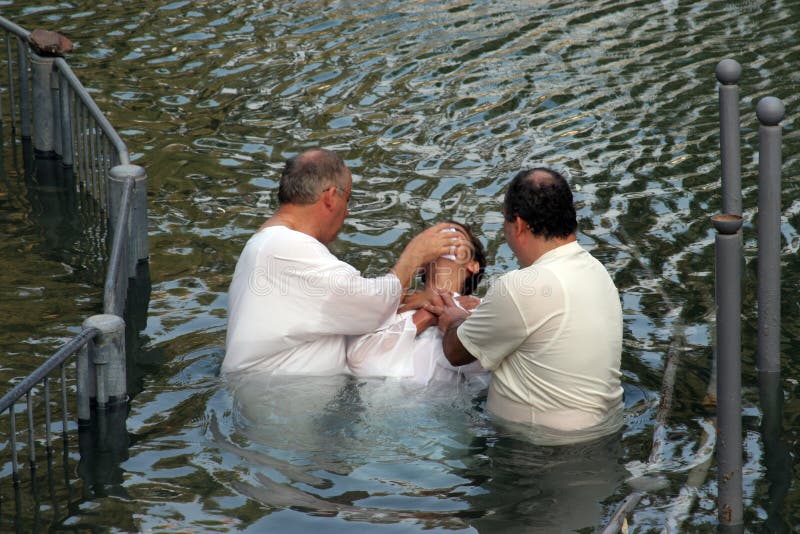 Baptismal site at Jordan river shore Baptism of pilgrims in Yardenit, Israel on September 30, 2006. Baptismal site at Jordan river shore Baptism of pilgrims in Yardenit, Israel on September 30, 2006