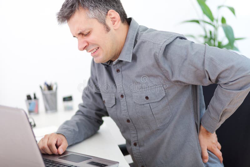 Dor traseira imagens de stock Dor traseira imagens de stock