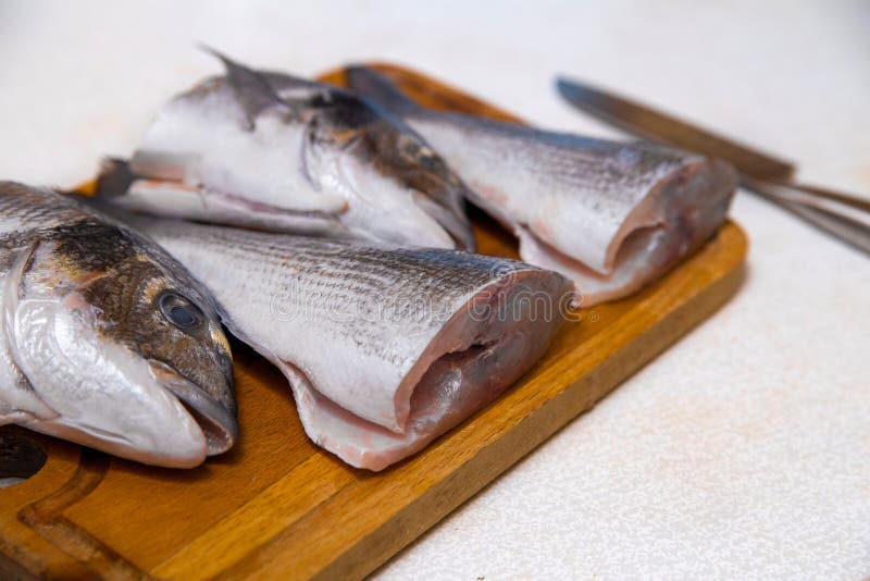 Dorado Fish Cutting Board Knife Cut Half Stock Photos Free & Royalty