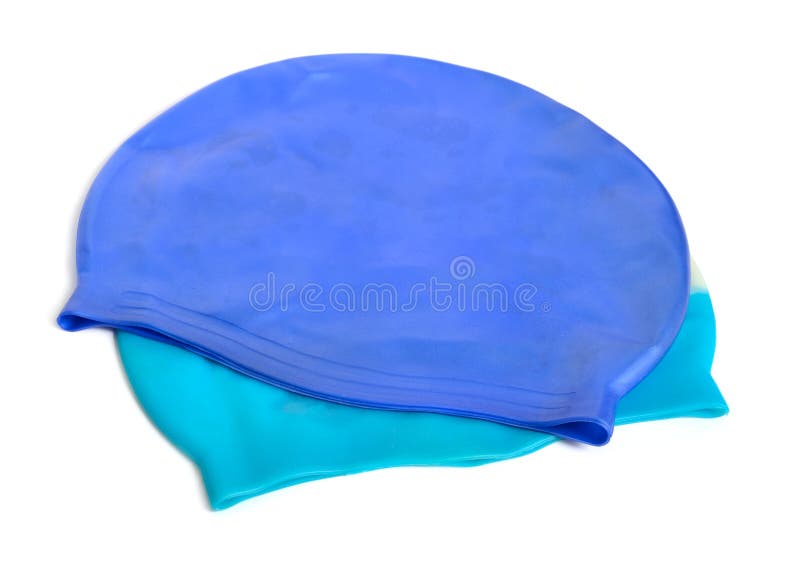 Dos casquillos de natación, casquillos de la nadada o casquillos de baño aislados en blanco imágenes de archivo libres de regalías Dos casquillos de natación, casquillos de la nadada o casquillos de baño aislados en blanco imágenes de archivo libres de regalías