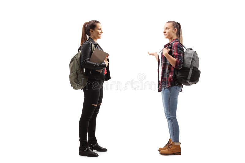 Dos Chicas Con Mochilas Hablando Foto de archivo - de gente, hablar: 164262484