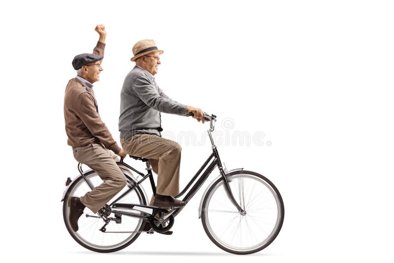 Dos hombres mayores alegres que montan una bicicleta junto imagenes de archivo Dos hombres mayores alegres que montan una bicicleta junto imagenes de archivo