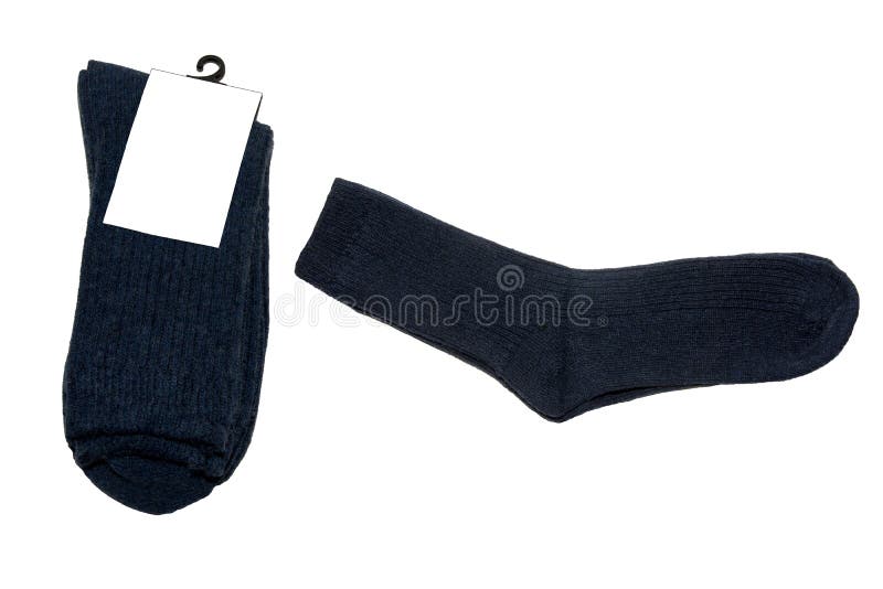 Two pairs of warm socks. New socks with price tags. Socks on hooks. White labels. Isolated. Two pairs of warm socks. New socks with price tags. Socks on hooks. White labels. Isolated.