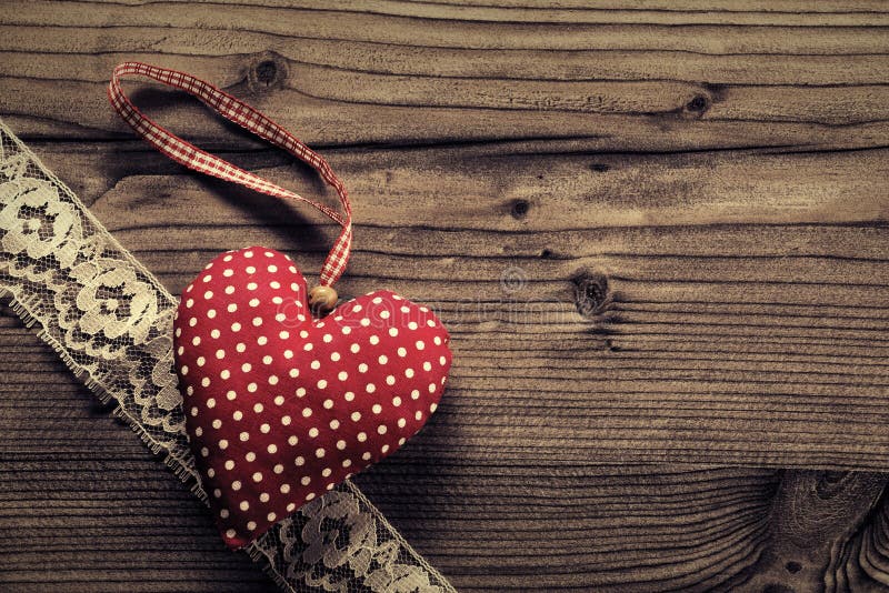 Dotted Fabric heart with lace wood background