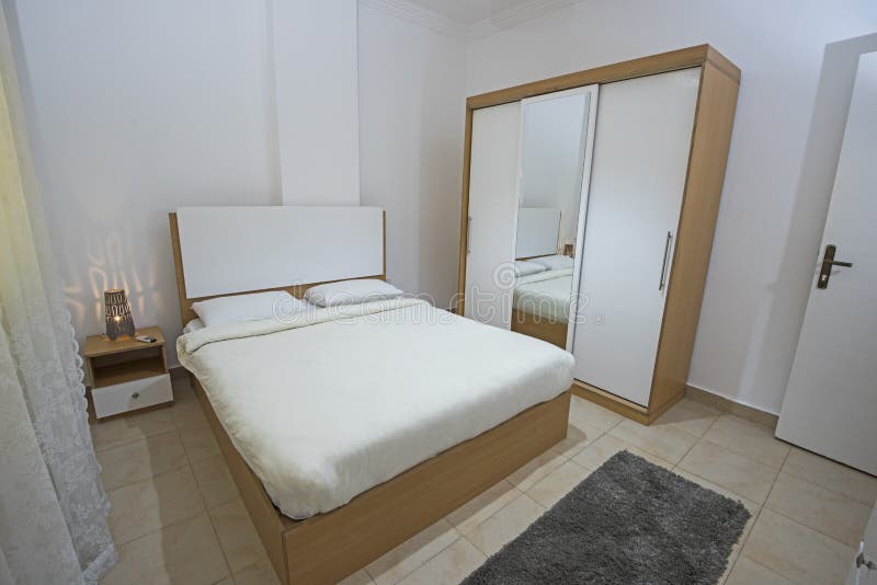 Double bed in a luxury apartment stock photography Double bed in a luxury apartment stock photography