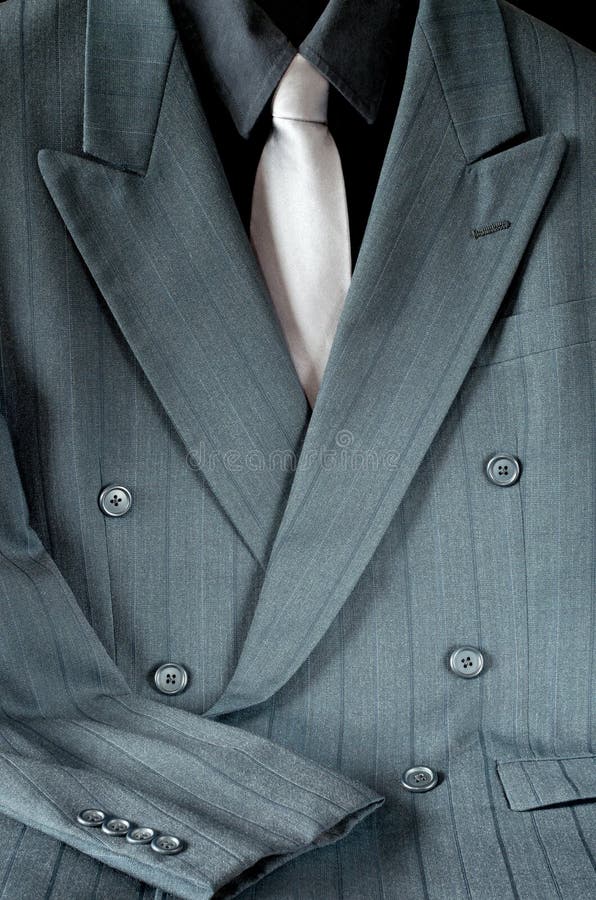 Double-breasted Suit and Tie. Double-breasted pinstripe gray suit or mens sport jacket and shirt with necktie stock photography Double-breasted Suit and Tie. Double-breasted pinstripe gray suit or mens sport jacket and shirt with necktie stock photography