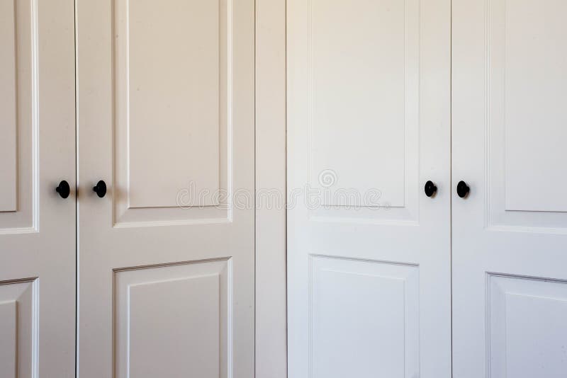 A stylish double closet doors with shelves