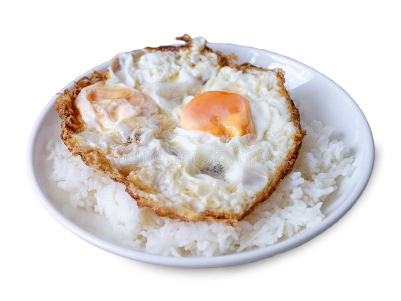 Double Crispy Fried Eggs on Steam Rice with Soy Sauce in White Dish