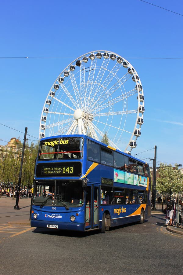 Double deck bus, Manchester in front of big wheel