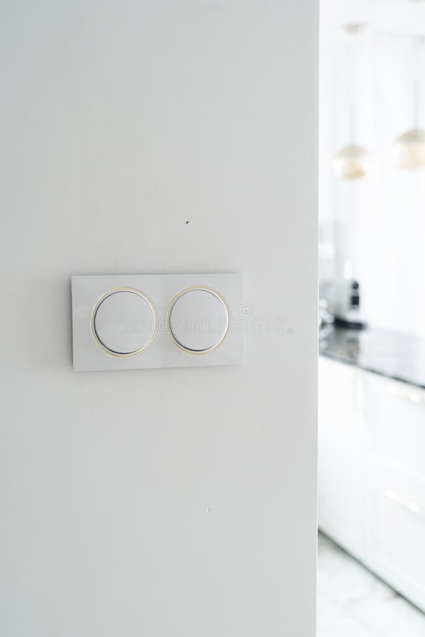 Double Electric Light Switch on White Concrete Wall Stock Image Image