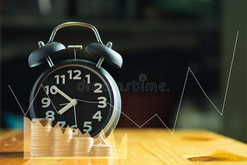 Double exposure of Alarm clock and step of coins stacks on working table with financial graph chart, time for savings money royalty free stock images