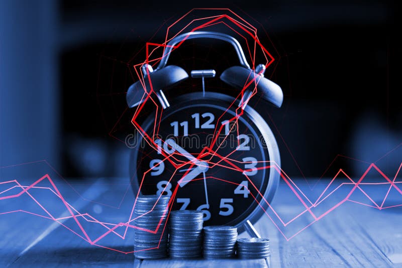 Double exposure of Alarm clock and step of coins stacks on working table with financial graph time for savings money concept. royalty free stock photography