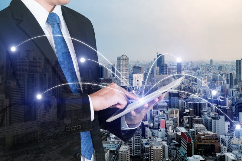 Double exposure of businessman using digital tablet pc with netw royalty free stock images