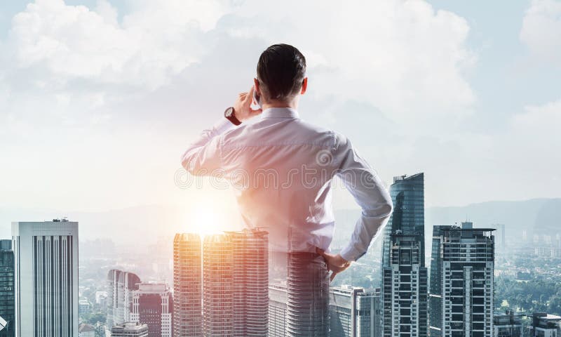 Concept of business success and control with confident boss against cityscape background stock photos Concept of business success and control with confident boss against cityscape background stock photos