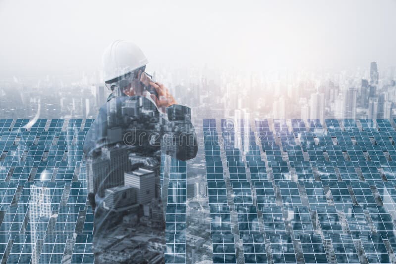 Double exposure-engineer using smartphone and tablet,control checking operation solar farm,photovoltaic panel,business and stock photo