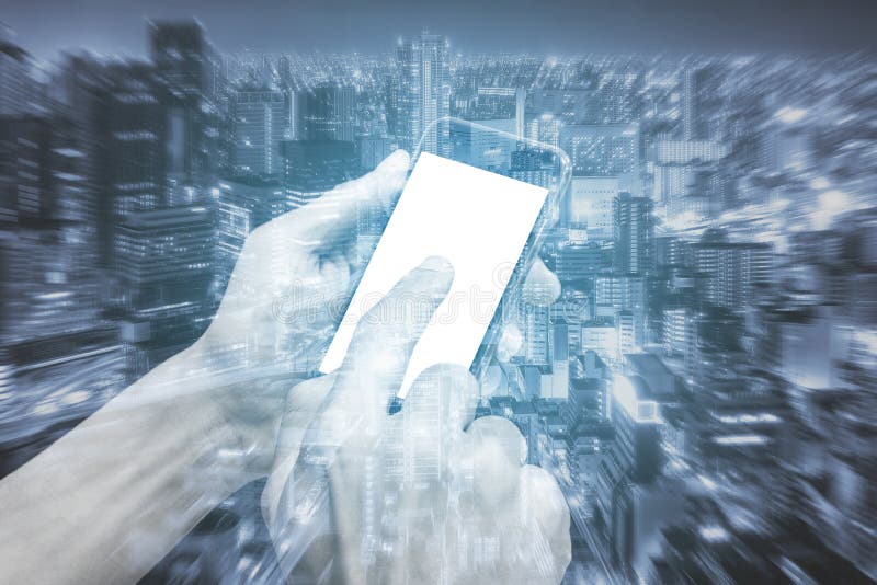 Double exposure hands using smartphone and city royalty free stock photos