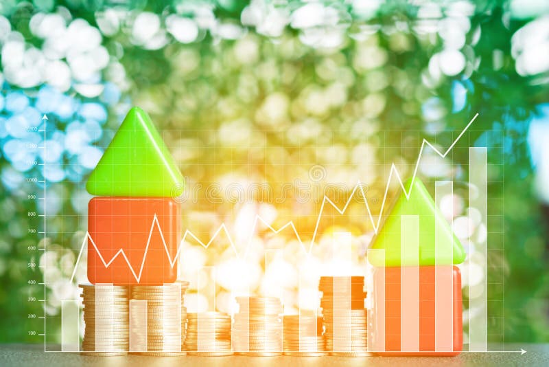 Double exposure of model house with step of coins stack and financial graph, real estate investment and saving banking money stock photography