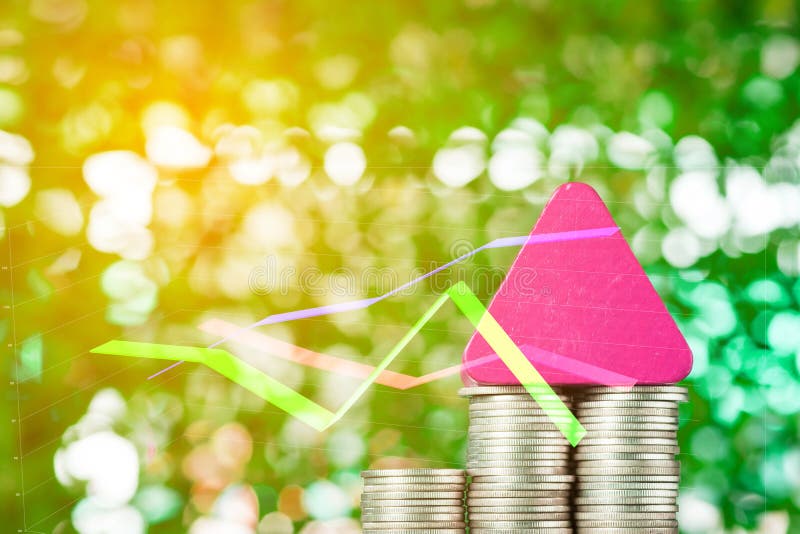 Double exposure of model house and step of coins stack with financial graph, real estate investment and saving banking money royalty free stock photos