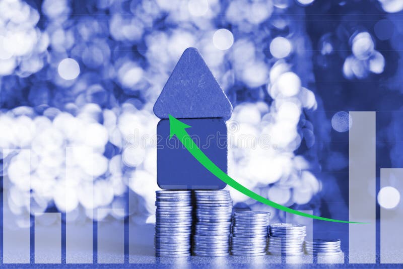 Double exposure of model house wood form with step of coins stack with financial graph, real estate investment and saving banking royalty free stock photos