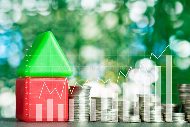 Double exposure of model house wood form with step of coins stack with financial graph, real estate investment and saving banking royalty free stock photos