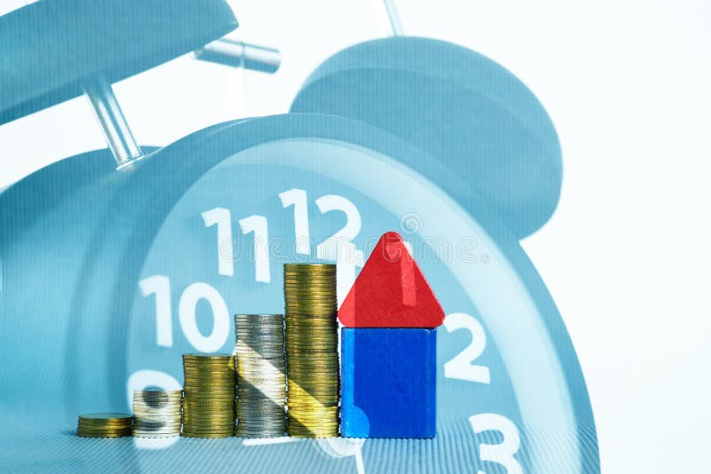 Double exposure of model house wood form with step of coins stack, alarm clock, real estate investment and savings banking stock images