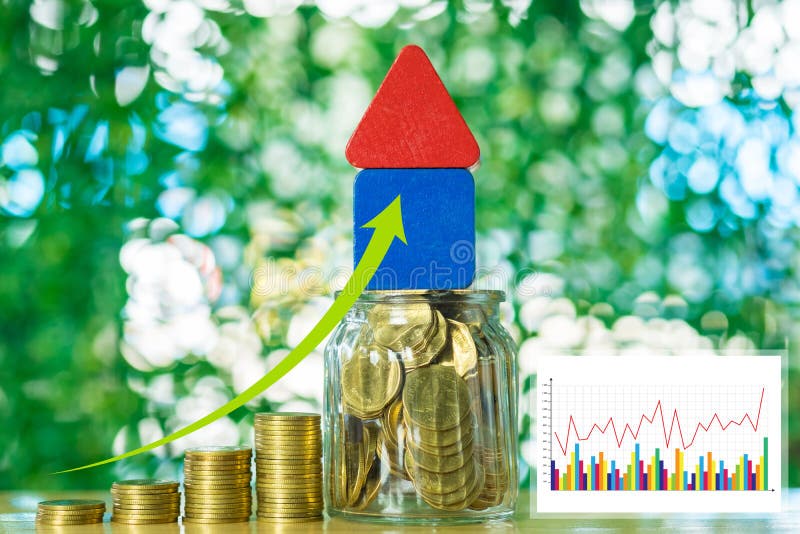 Double exposure of model house wood form with step of coins stack with financial graph, real estate investment and saving banking stock photography
