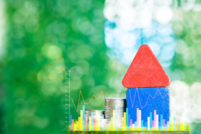 Double exposure of model house wood form with step of coins stack with financial graph, real estate investment and saving banking stock photography