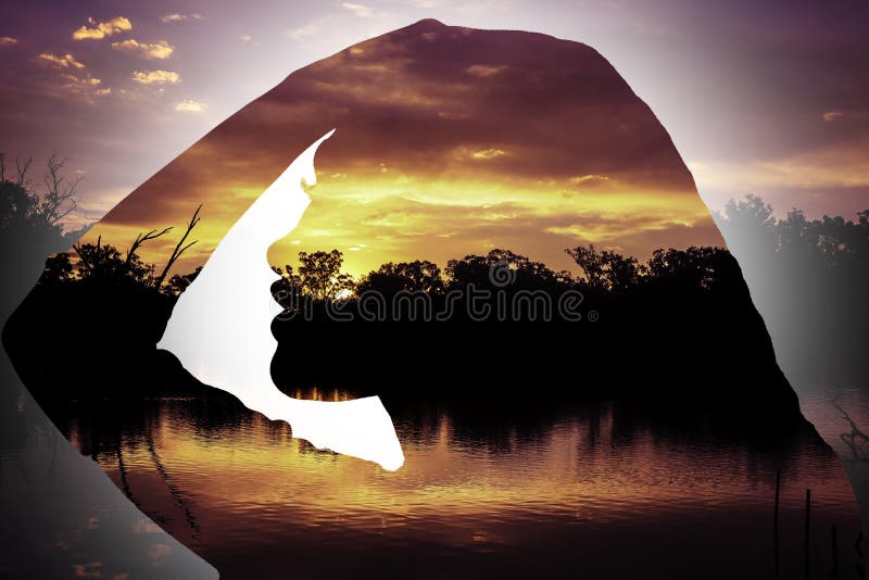 Sunset Silhouette of young girl side profile