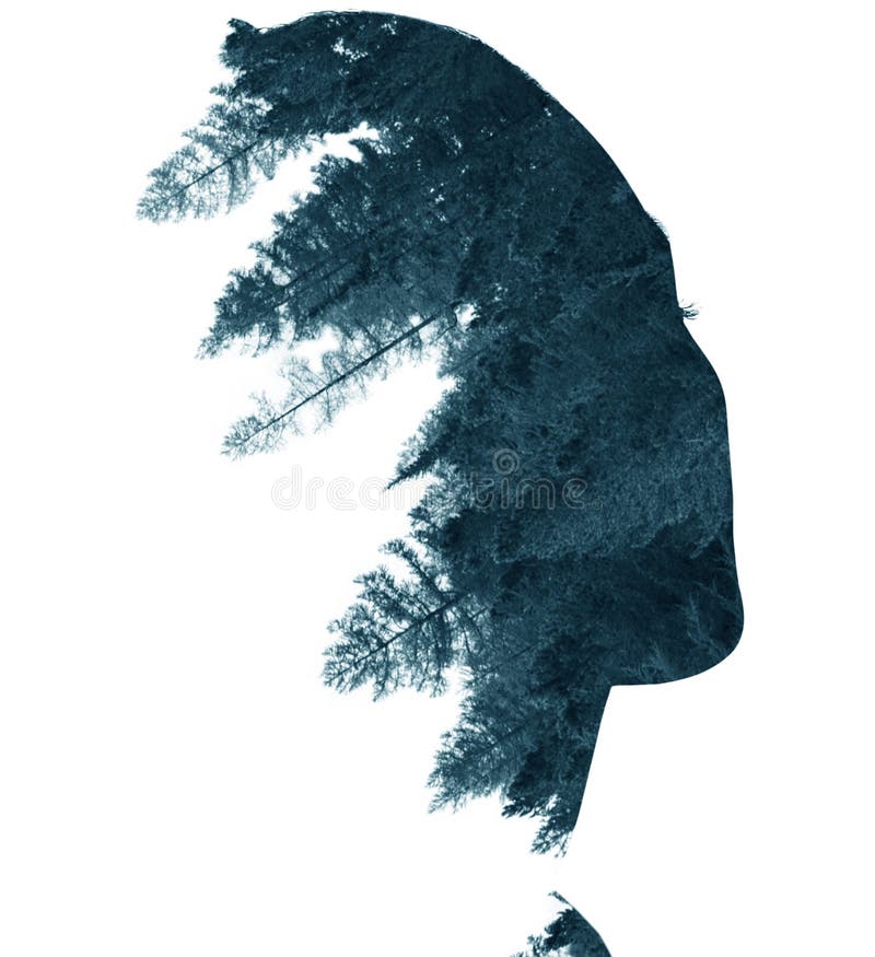 Double exposure of woman in profile and forest.