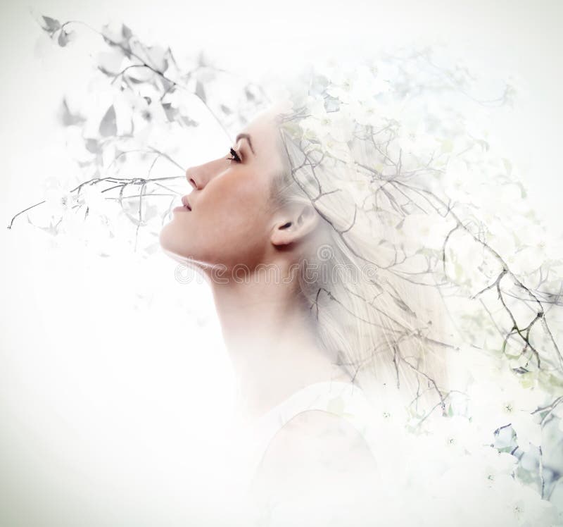 Double exposure of young woman and dogwood flowers