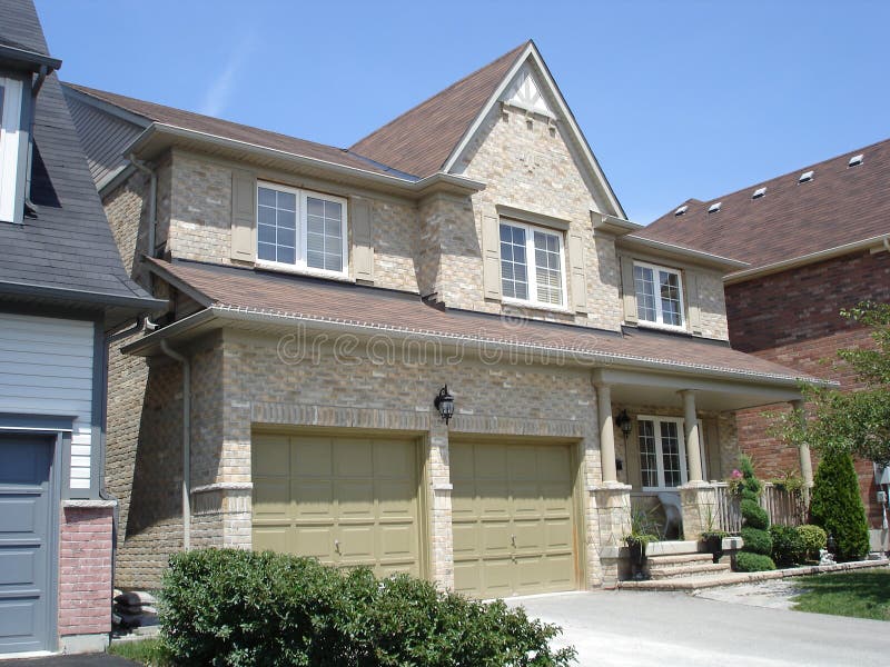 Double garage on stylish brick house