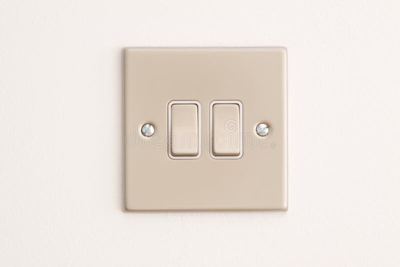 Double Lightswitch on a White Wall stock images