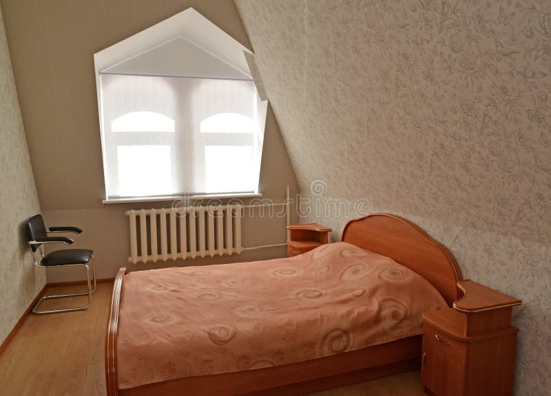 The Double Room on the Mansard Floor of Cheap Hotel Stock Photo Image