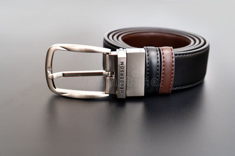 Double-sided Black and Brown Leather Belt with an Unbuttoned Buckle on ...