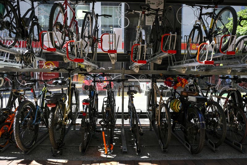 Double Storey Bike Rack In City. Efficient Storage And