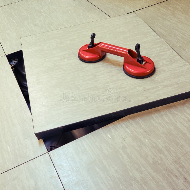 Double vacuum equipment for removing tiles from floors in industrial buildings stock images