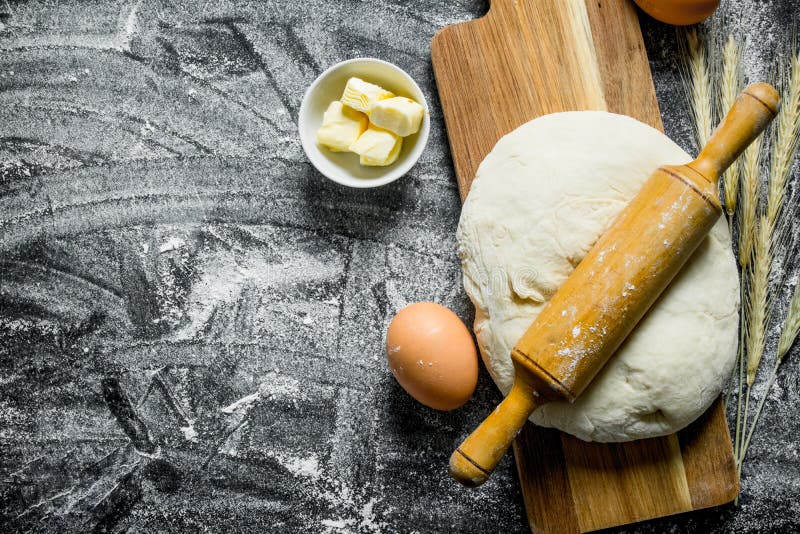 Dough on a Cutting Board with a Rolling Pin Stock Image Image of cake