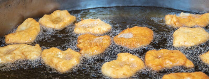 Dough Donuts are Fried in Oil. a Cafe Stock Photo Image of cooking