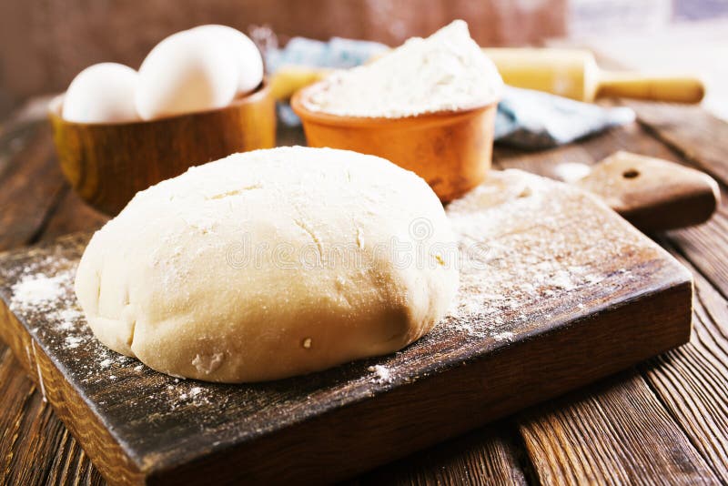 Dought and ingredients, fresh dought on a table. Dought stock images, royalty-free photos and pictures