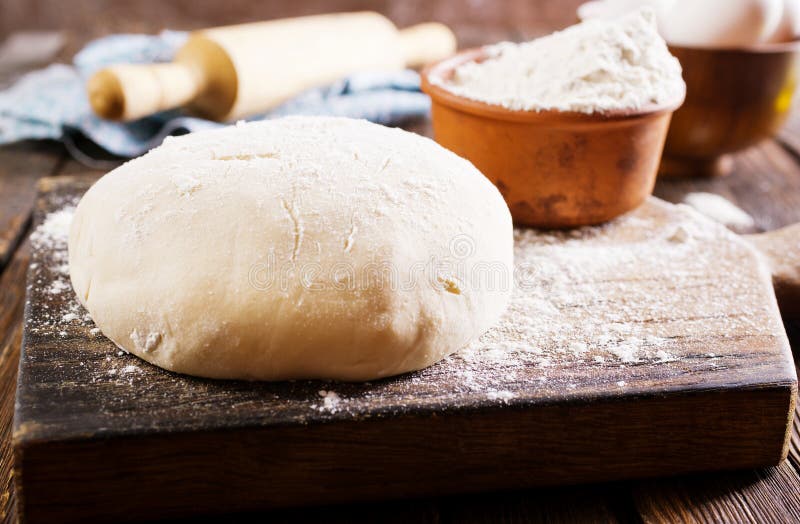 Dought and ingredients, fresh dought on a table. Dought stock images, royalty-free photos and pictures