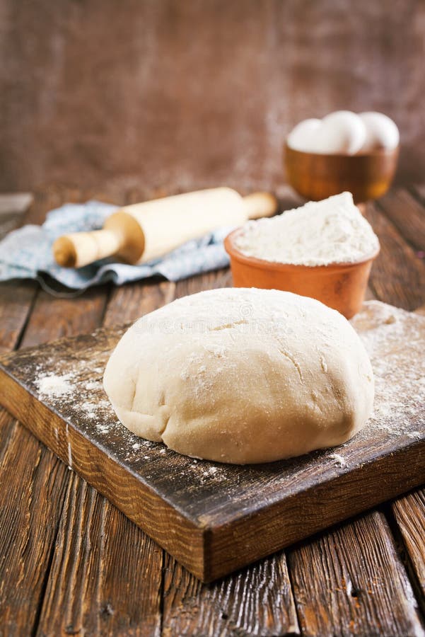 Dought and ingredients, fresh dought on a table. Dought stock images, royalty-free photos and pictures