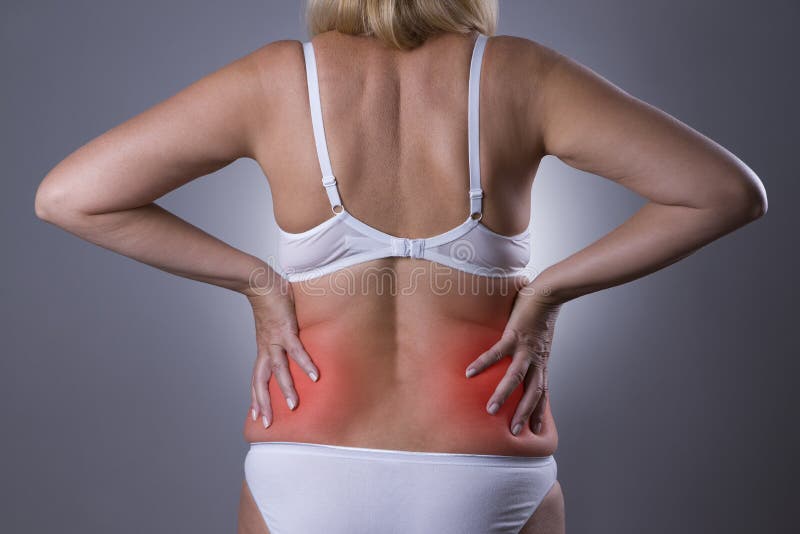 Douleurs de dos, inflammation de rein, mal chez le corps du ` s de la femme photos stock Douleurs de dos, inflammation de rein, mal chez le corps du ` s de la femme photos stock