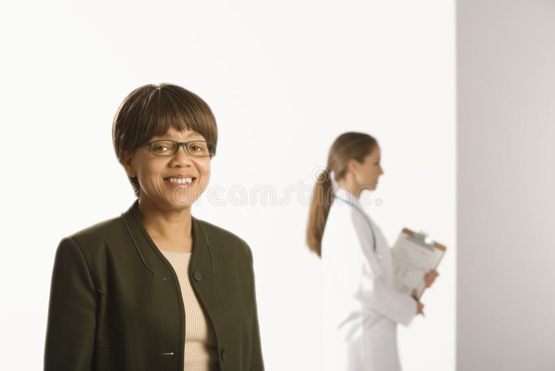 Doutor e paciente. imagem de stock royalty free Doutor e paciente. imagem de stock royalty free