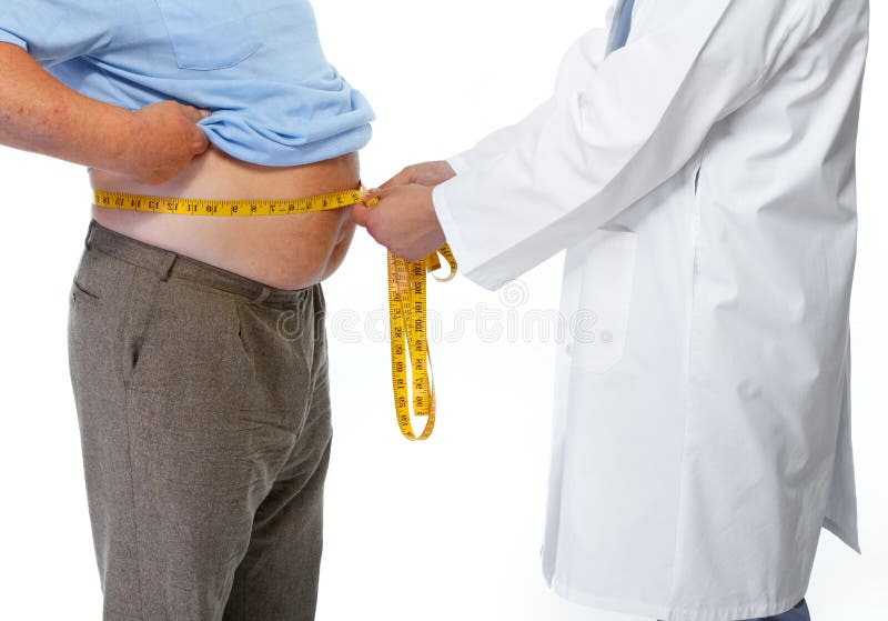 Doutor que mede o estômago obeso do homem foto de stock Doutor que mede o estômago obeso do homem foto de stock