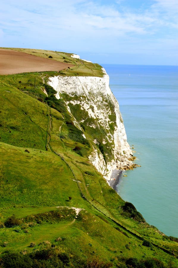 White cliffs of Dover stock photo. Image of boat, house 25610524