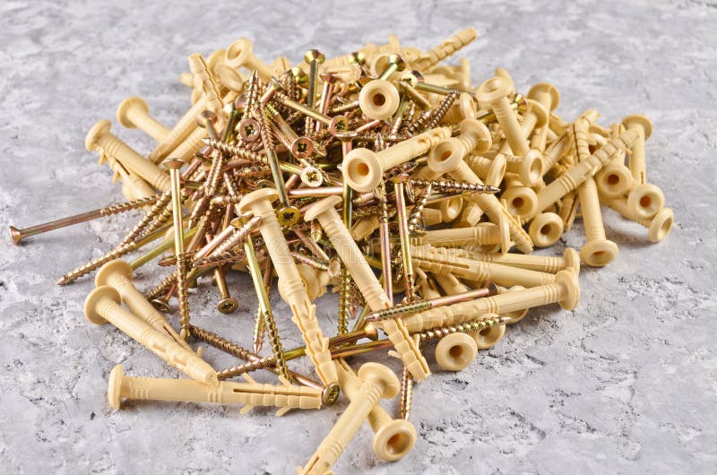 Dowel Screws on a Concrete Surface. Stock Photo Image of equipment